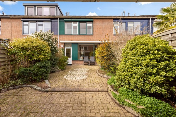 Foto - Te koop: tussenwoning gelegen aan groenvoorziening